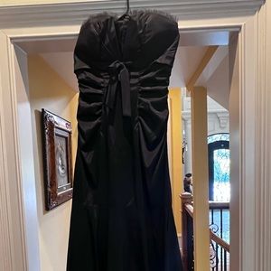 Fancy strapless evening gown.